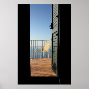 White metal armchair beside fence in the morning poster