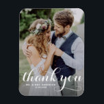 White Modern Calligraphy Photo Wedding Magnet<br><div class="desc">Celebrate your love and show gratitude with our customizable photo wedding thank you magnet! This unique keepsake is perfect for reminding your loved ones of your special day while expressing your heartfelt thanks in a memorable way. It features a modern typography photo overlay. Personalize by adding your photo and details....</div>