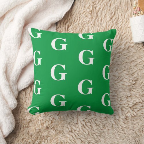 White Monogram Pattern on Green Background Throw Pillow