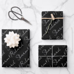 White on black script calligraphy names wedding wrapping paper sheets<br><div class="desc">Personalize your wedding with these elegant wrapping paper sheets featuring the couple's names in white script calligraphy on black. You can enter your names in the customization field and adjust the text size as needed to fit the design. These wrapping paper sheets are perfect for adding a touch of class...</div>