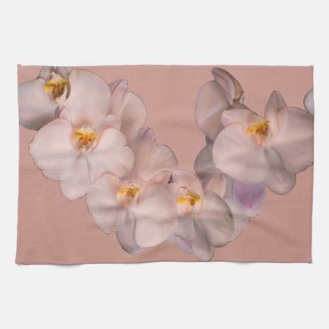 White orchid on badge kitchen towel (Horizontal)