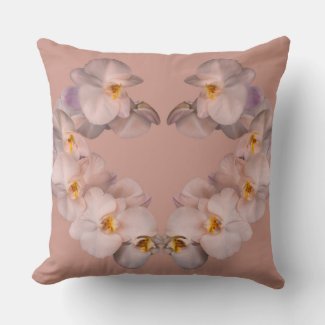 White orchids flowers on badge