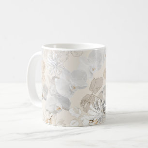 White orchids on a light cream   coffee mug