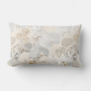 White orchids on a light cream lumbar pillow