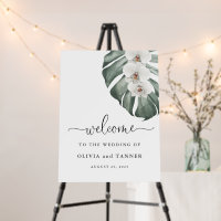 White Orchids on Monstera Tropical Wedding Welcome