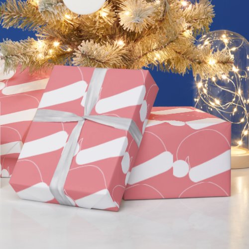 White Outline Christmas Hat On Pink Wrapping Paper