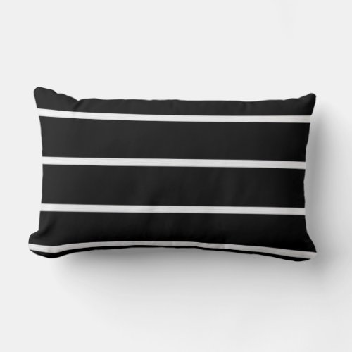 White painted stripes on black lumbar pillow