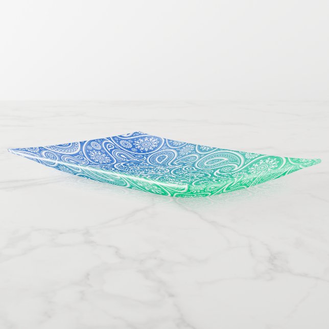 White paisley pattern on blue to green ombre trinket tray (Angled)