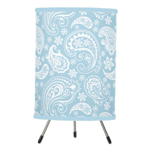 White paisley pattern on blue tripod lamp