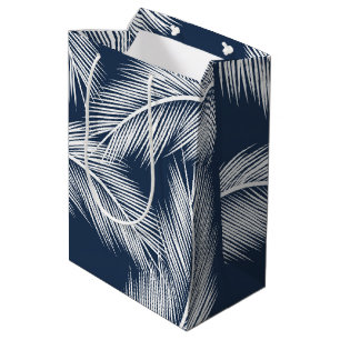 White palm leaves on dark blue color background medium gift bag