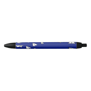 White paper planes on blue pen