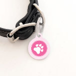 White Paw On Pink Color With Custom Pet Info Pet Name Tag<br><div class="desc">White dog paw silhouette on a pink circle background. On the other side there are personalizable text areas for the name of your pet and for your phone number.</div>