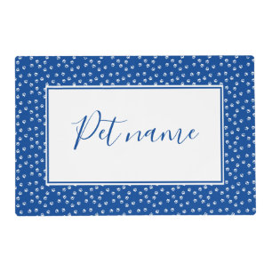 white pawprints placemat