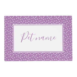 white pawprints placemat