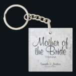 White Peonies & Hearts Mother of the Bride Wedding Keychain<br><div class="desc">This beautiful keychain is perfect for thanking the Mother of the Bride. Designed as a part of our White Reflections Wedding Suite, it features black text over a background of reflecting white flowers and hearts. The text is fully customizable and reads: Mother of the Bride, with a place for her...</div>