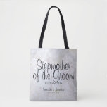 White Peonies Wedding Stepmother of the Groom Tote Bag<br><div class="desc">This beautiful tote bag is perfect for thanking the stepmother of the Groom. It features modern script lettering over a background of reflecting white peony flowers and hearts. The text is fully customizable and reads: stepmother of the Groom, with a place for her name, the couple's names and wedding date....</div>
