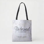 White Peony Flowers & Hearts Bridesmaid Wedding Tote Bag<br><div class="desc">This beautiful tote bag is perfect for thanking your bridesmaids. It features modern black script lettering over a background of reflecting white peony flowers and hearts. The text is fully customizable and reads: Bridesmaid, with a place for her name, the couple's names and wedding date. Perfect for filling with wedding...</div>