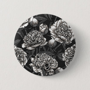 White peony flowers on dark gray button