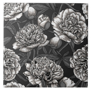 White peony flowers on dark gray ceramic tile
