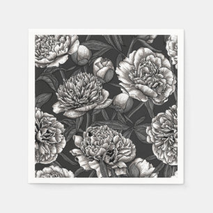 White peony flowers on dark gray napkins