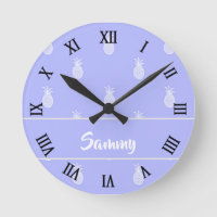White pineapple silhouette on blue round clock
