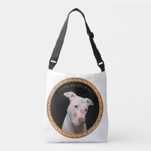 White pitbull with red kisses all over his face. crossbody bag