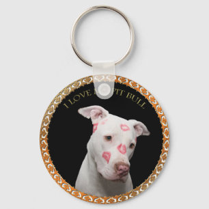 White pitbull with red kisses all over his face. keychain