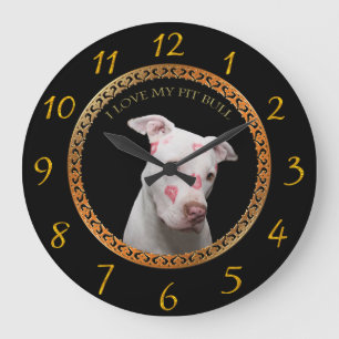 White pitbull with red kisses all over his face. large clock