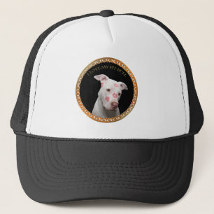 White pitbull with red kisses all over his face. trucker hat