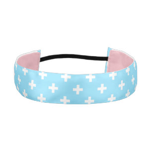 White polka crosses on baby blue athletic headband