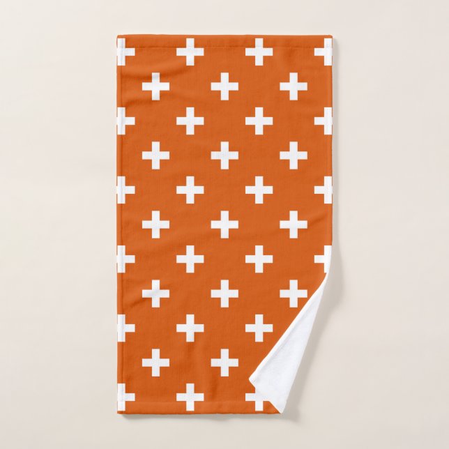 White polka crosses on burnt orange hand towel  (Hand Towel)