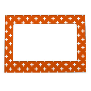 White polka crosses on burnt orange magnetic frame