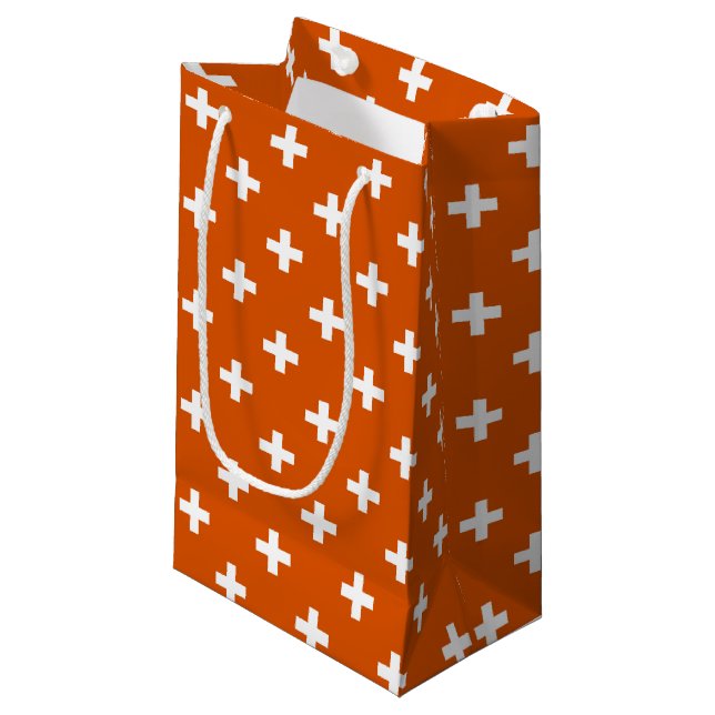 White polka crosses on burnt orange small gift bag (Front Angled)