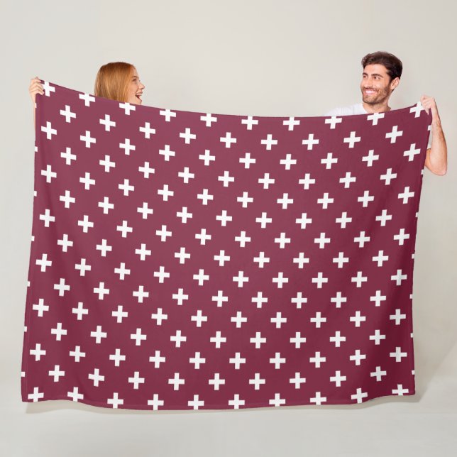 White polka crosses on mulberry fleece blanket (In Situ)