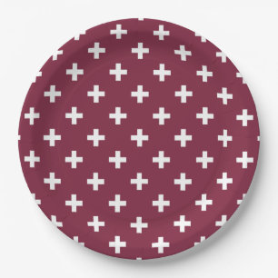 White polka crosses on mulberry paper plates