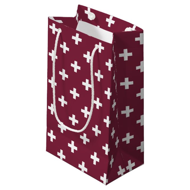 White polka crosses on mulberry small gift bag (Front Angled)