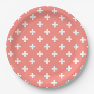 White polka crosses on peach paper plates