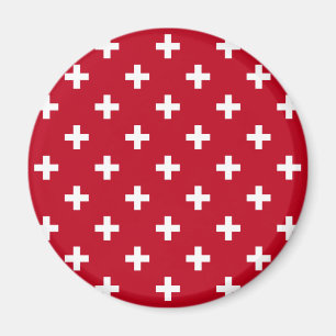 White polka crosses on red magnet