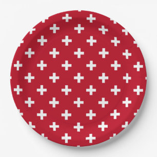 White polka crosses on red paper plates