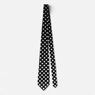 White polka dot graduation and black background tie