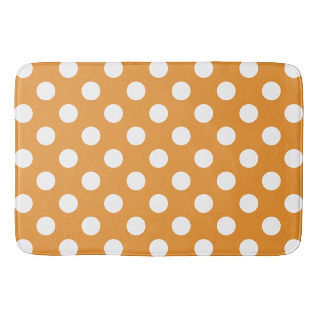 White polka dots on amber bath mat (Front)