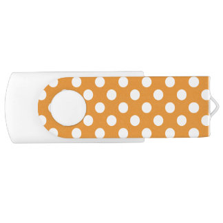 White polka dots on amber flash drive
