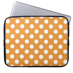 White polka dots on amber laptop sleeve