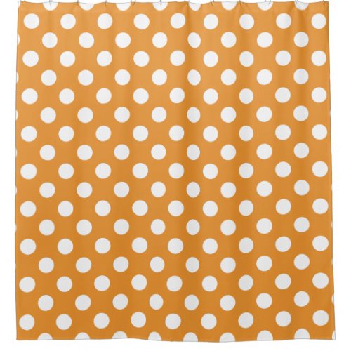 White polka dots on amber shower curtain