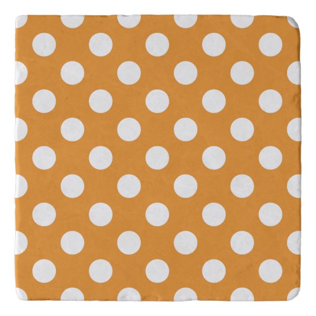 White polka dots on amber trivet (Front)