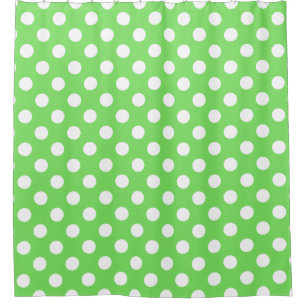 White polka dots on apple green shower curtain