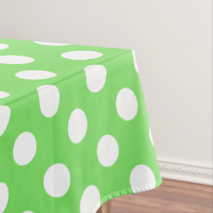 White polka dots on apple green tablecloth