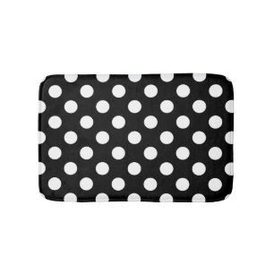 White polka dots on black bathroom mat