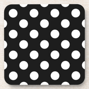 White polka dots on black beverage coaster