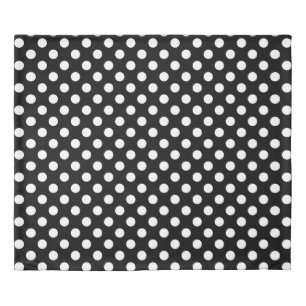 White polka dots on black duvet cover